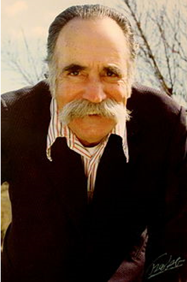 A person with a white beardDescription automatically generated with medium confidence